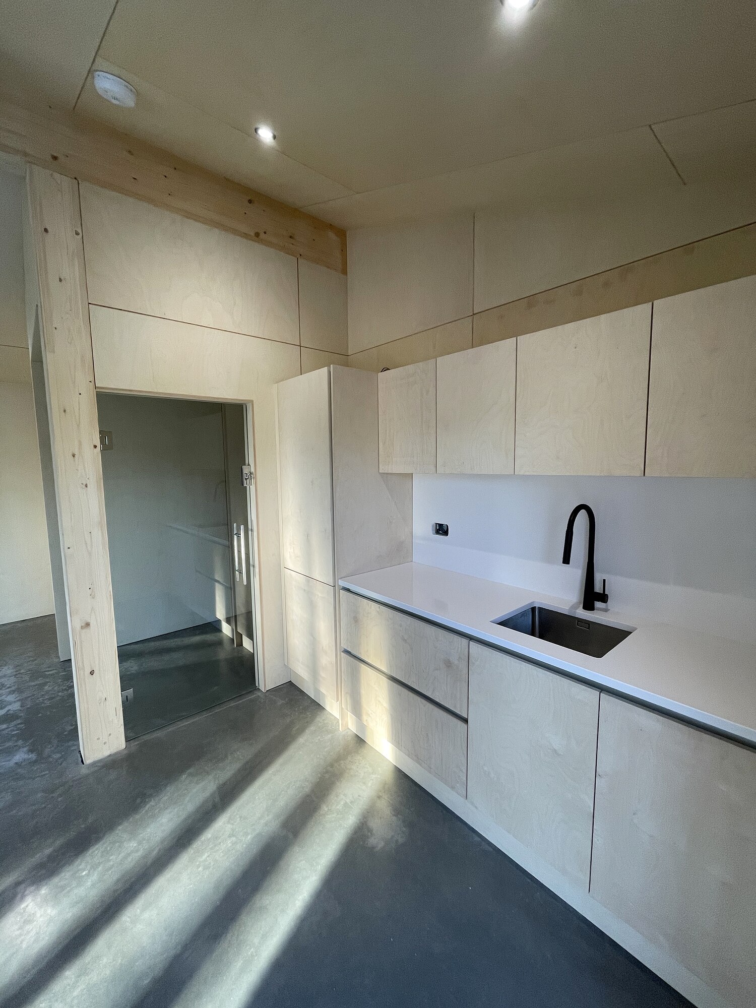 Birch ply interior with polished concrete floor, The Birch Room, Suffolk