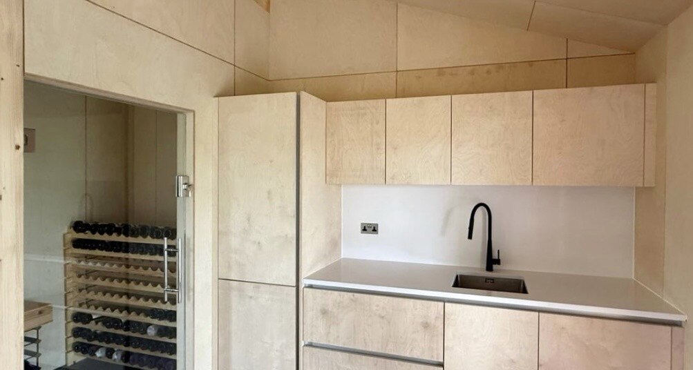 Birch ply kitchen with polished concrete floor, The Birch Room