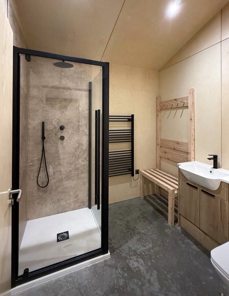 Shower room with birch ply, black fittings and polished concrete, The Birch Room