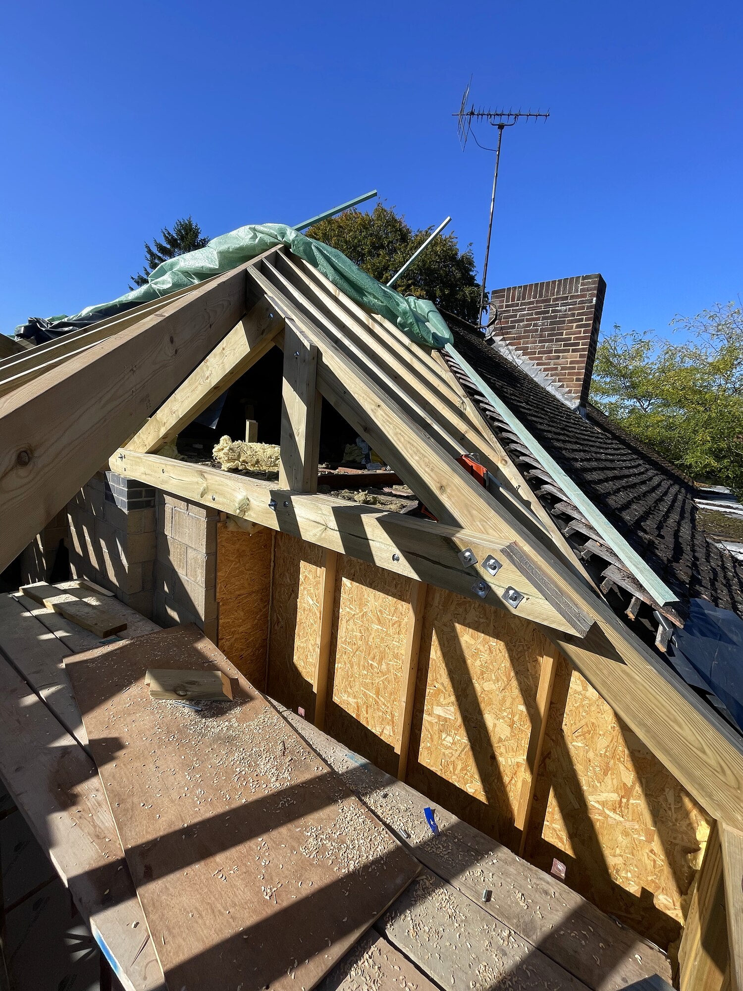 Engineered ridge beam and steel bolt plate detail, Colchester roof