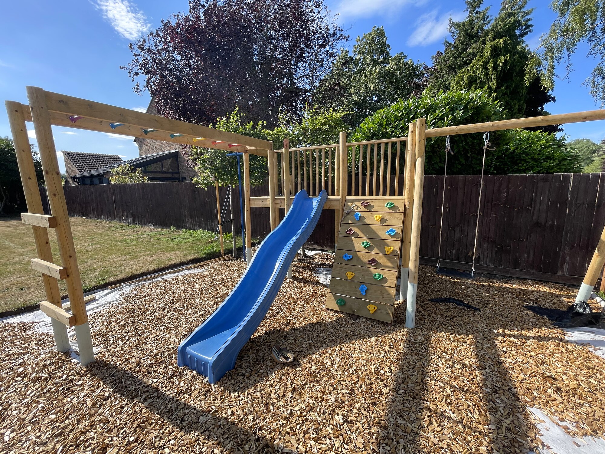 Bespoke timber climbing frame, slide and swing set